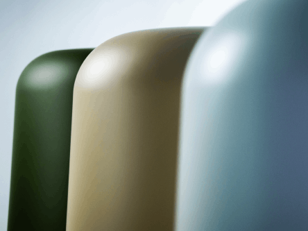 Close-up of three IRIS drone detection radars in different colours